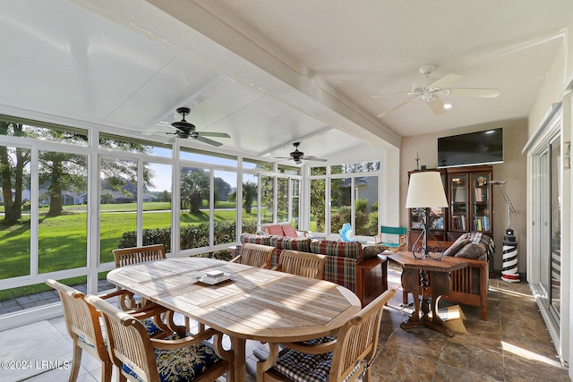 sunroom / solarium with beamed ceiling