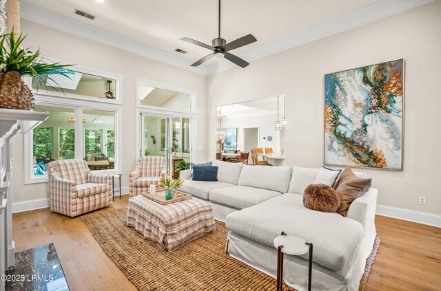 1 Wild Magnolia Ct, Okatie, SC 29909 - living area featuring a ceiling fan, light wood finished floors, baseboards, crown molding, and recessed lighting