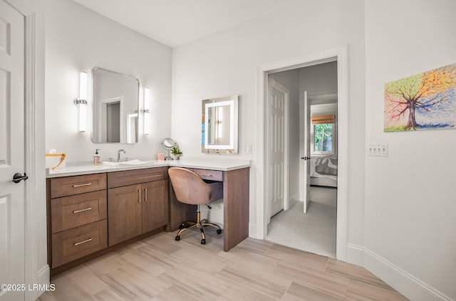 1 Wild Magnolia Ct, Okatie, SC 29909 - bathroom featuring vanity, connected bathroom, and baseboards