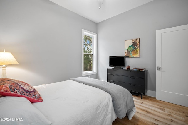 bedroom with light wood-type flooring