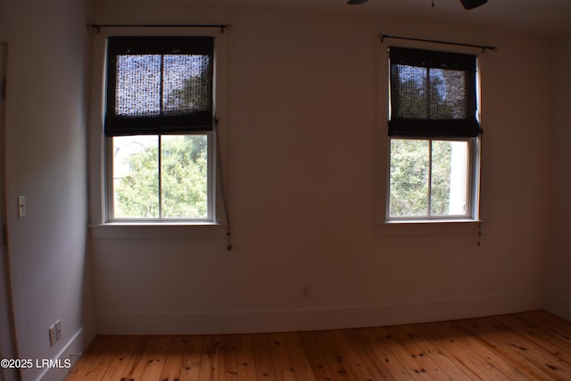 spare room featuring light hardwood / wood-style flooring