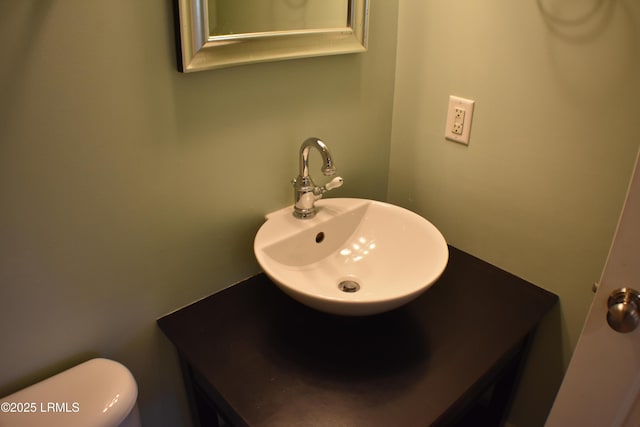 bathroom with toilet and sink