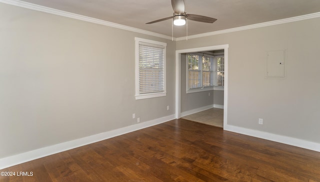 unfurnished room featuring crown molding, ceiling fan, electric panel, and hardwood / wood-style floors