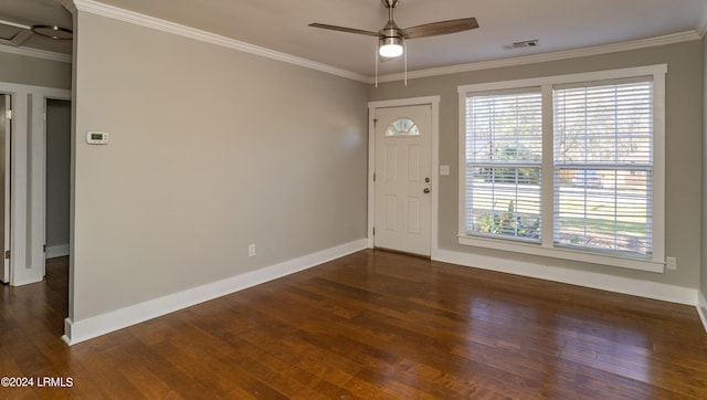 entrance foyer with crown molding, dark wood-type flooring, and ceiling fan