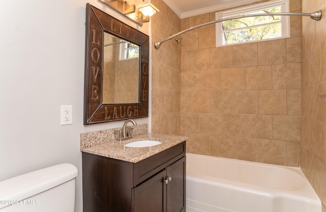 full bathroom with tiled shower / bath combo, vanity, ornamental molding, and toilet