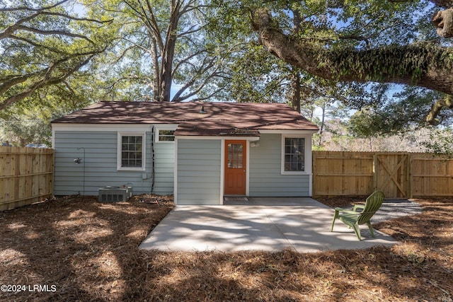 back of house with a patio area