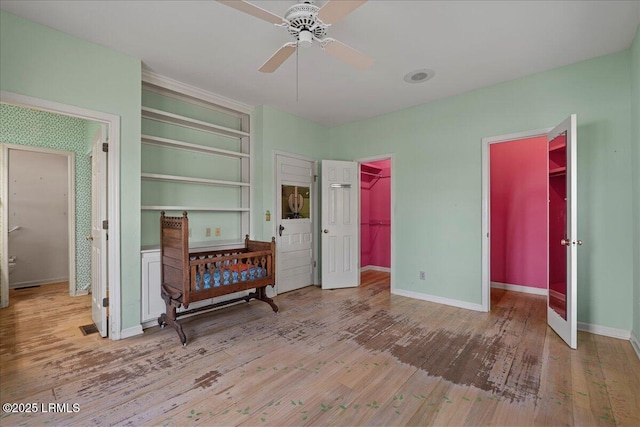 10 Broomfield Ln, Beaufort, SC 29907 - bedroom with hardwood / wood-style floors, baseboards, and a ceiling fan