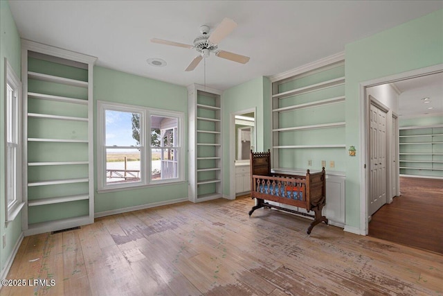 10 Broomfield Ln, Beaufort, SC 29907 - living area with hardwood / wood-style floors, a ceiling fan, built in features, and baseboards