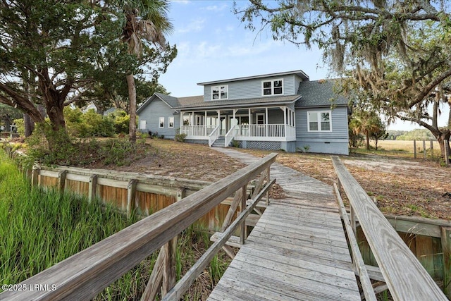 10 Broomfield Ln, Beaufort, SC 29907 - back of house with covered porch and a shingled roof