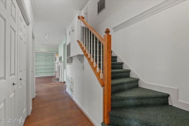 10 Broomfield Ln, Beaufort, SC 29907 - staircase with wood finished floors and recessed lighting