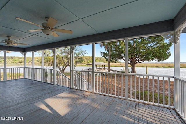 10 Broomfield Ln, Beaufort, SC 29907 - unfurnished sunroom featuring a ceiling fan and a water view