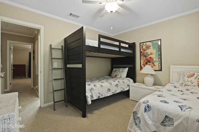 96 Mathews Dr Unit 145, Hilton Head Island, SC 29926 - carpeted bedroom with attic access, ornamental molding, and a ceiling fan