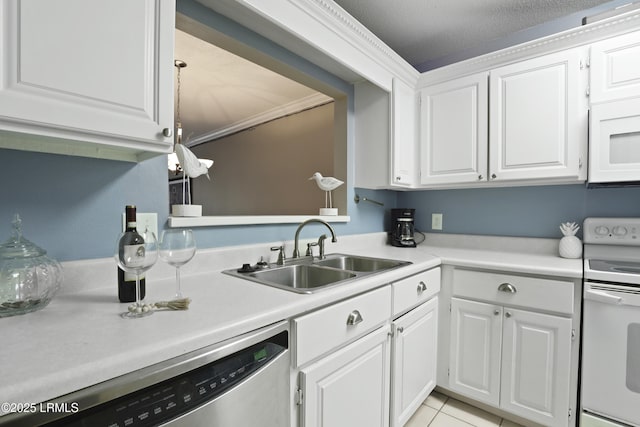 96 Mathews Dr Unit 145, Hilton Head Island, SC 29926 - kitchen featuring white appliances, white cabinetry, and light countertops