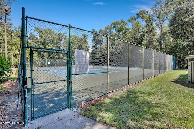 96 Mathews Dr Unit 145, Hilton Head Island, SC 29926 - view of tennis court with a gate