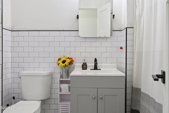 100 Drayton Dr, Ridgeland, SC 29936 - bathroom with tile walls, vanity, and a shower with shower curtain