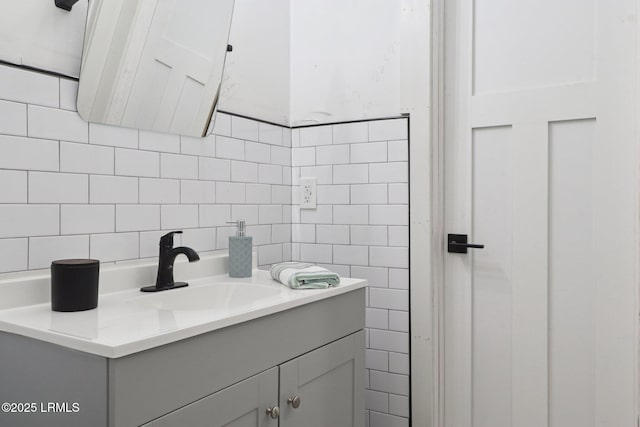 100 Drayton Dr, Ridgeland, SC 29936 - bathroom featuring vanity, tile walls, and tasteful backsplash