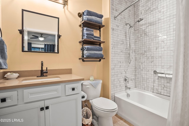 bathroom with vanity, toilet, shower / bathtub combination with curtain, and a ceiling fan