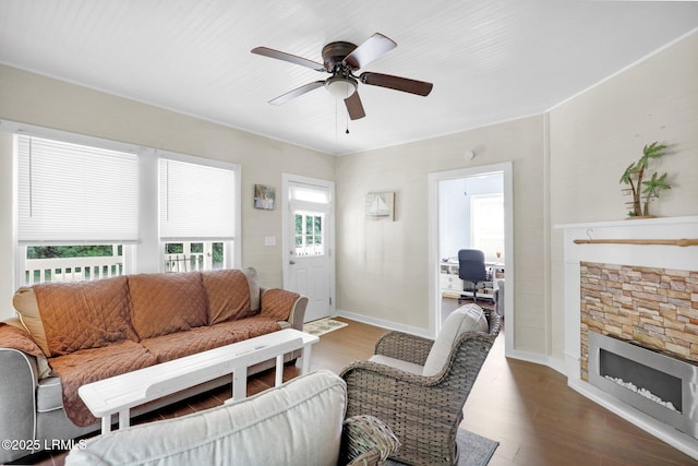 123 Moore St, Walterboro, SC 29488 - living area featuring a ceiling fan, dark wood finished floors, a fireplace, and a desk