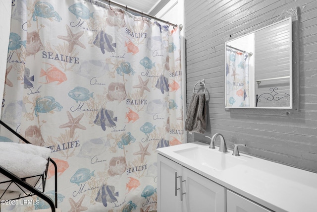 123 Moore St, Walterboro, SC 29488 - bathroom with vanity, wooden walls, and curtained shower
