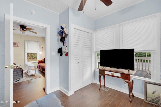 123 Moore St, Walterboro, SC 29488 - interior space featuring a ceiling fan and dark wood-type flooring