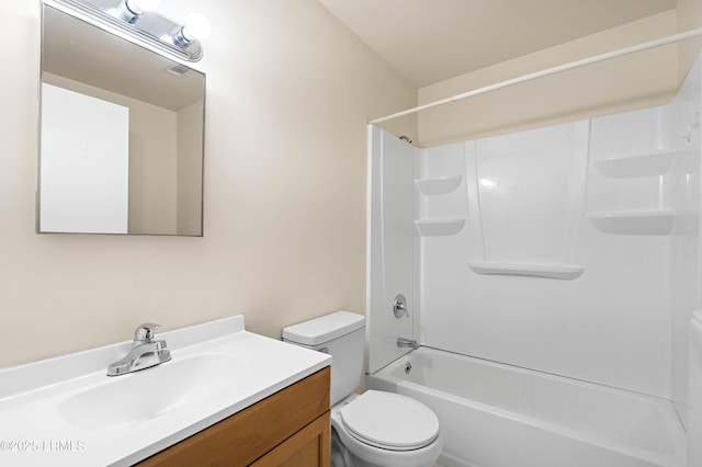 full bath featuring toilet, vanity, and bathtub / shower combination