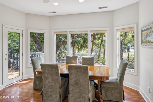 8 Chechessee Cir, Okatie, SC 29909 - dining space featuring baseboards, wood finished floors, visible vents, and recessed lighting