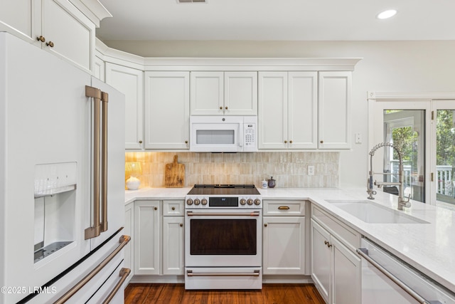 8 Chechessee Cir, Okatie, SC 29909 - kitchen with tasteful backsplash, white cabinets, recessed lighting, a sink, and premium appliances