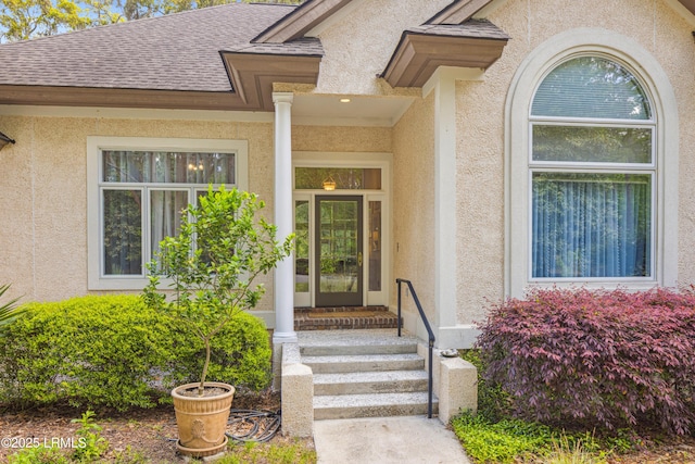 8 Chechessee Cir, Okatie, SC 29909 - doorway to property featuring stucco siding and a shingled roof
