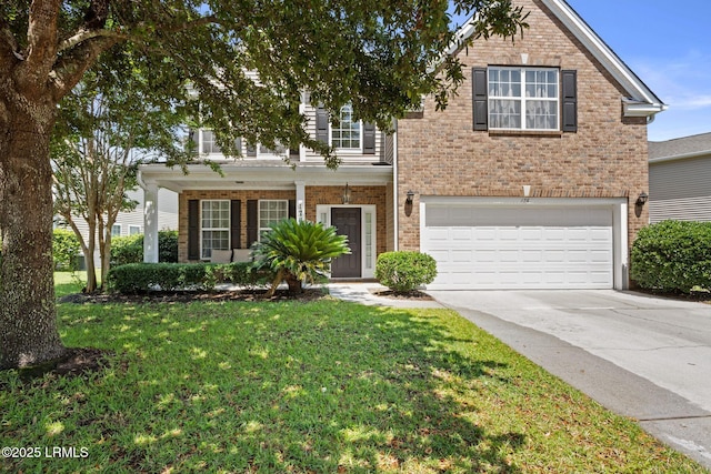 176 Pickett Mill Blvd, Bluffton, SC 29909 - view of front facade with a garage, brick siding, and driveway