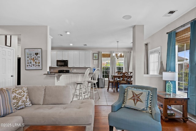 176 Pickett Mill Blvd, Bluffton, SC 29909 - living area featuring a chandelier, recessed lighting, and wood finished floors