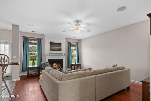 176 Pickett Mill Blvd, Bluffton, SC 29909 - living area with a fireplace, ceiling fan, and dark wood finished floors
