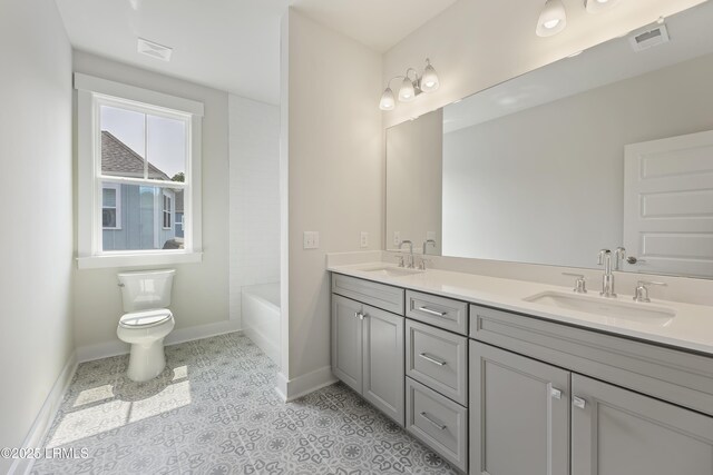 6 Skipperling Ct, Bluffton, SC 29909 - bathroom with baseboards, toilet, double vanity, and tile patterned floors