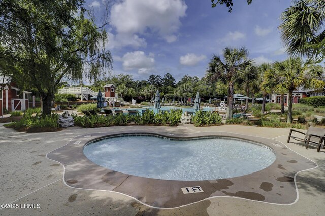 6 Skipperling Ct, Bluffton, SC 29909 - community pool featuring a patio area