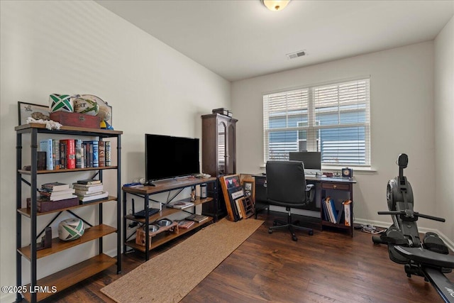 office featuring vaulted ceiling and dark hardwood / wood-style floors