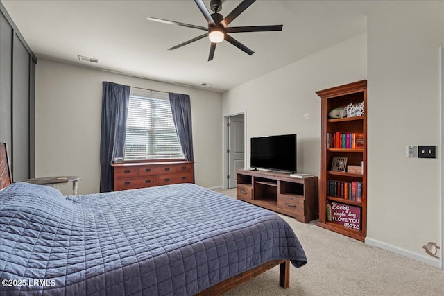 carpeted bedroom with ceiling fan