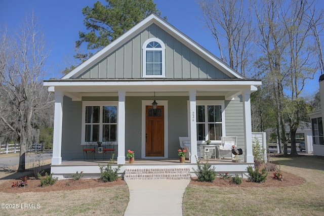 view of front of home with covered porch and board and batten siding