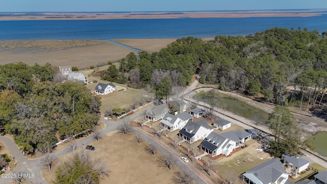 aerial view featuring a residential view and a water view