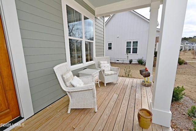 wooden terrace with a porch