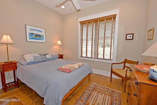 bedroom with a ceiling fan, recessed lighting, baseboards, and wood finished floors