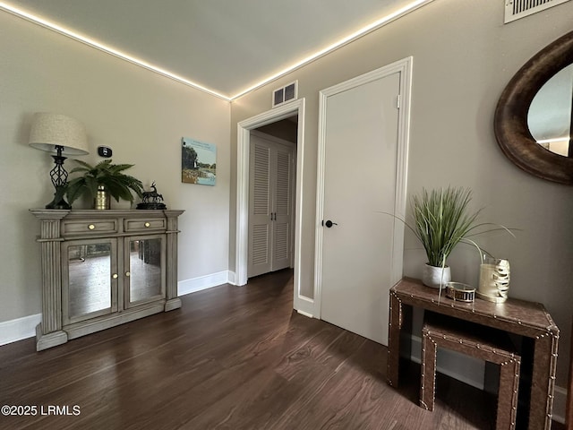 2410 Pine Ct N, Beaufort, SC 29902 - hallway featuring dark wood finished floors and baseboards