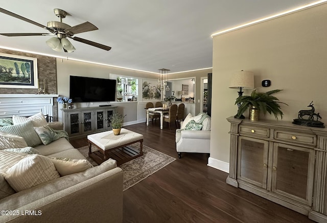2410 Pine Ct N, Beaufort, SC 29902 - living area with a ceiling fan, baseboards, and dark wood finished floors