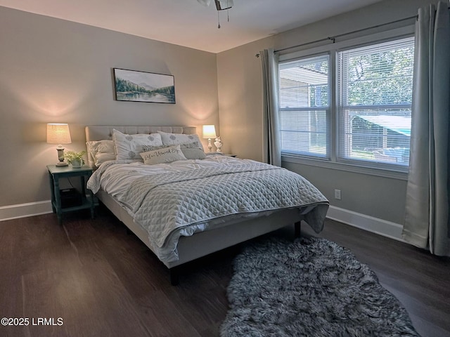 2410 Pine Ct N, Beaufort, SC 29902 - bedroom featuring dark wood-style floors and baseboards