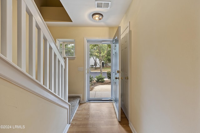 foyer with light hardwood / wood-style flooring