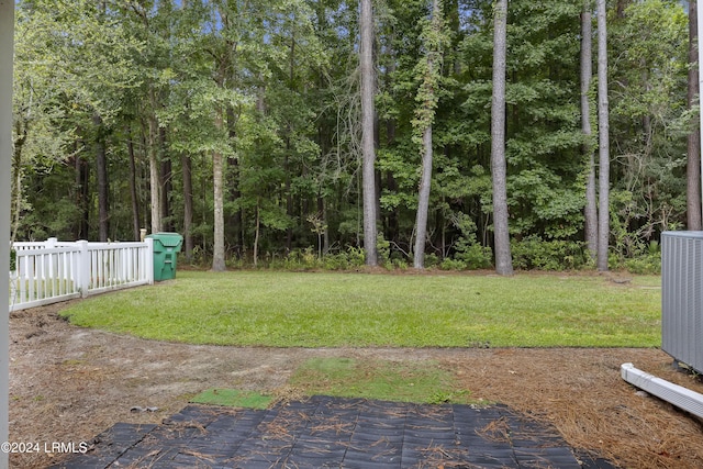 view of yard featuring central AC unit