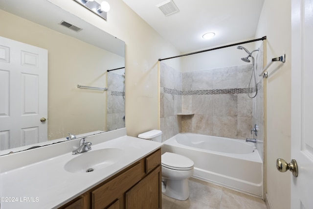 full bathroom featuring tile patterned flooring, shower / tub combination, vanity, and toilet