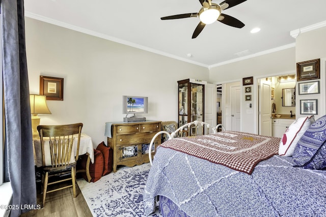 1619 Promenade Ln, Okatie, SC 29909 - bedroom featuring crown molding, wood finished floors, a ceiling fan, and connected bathroom