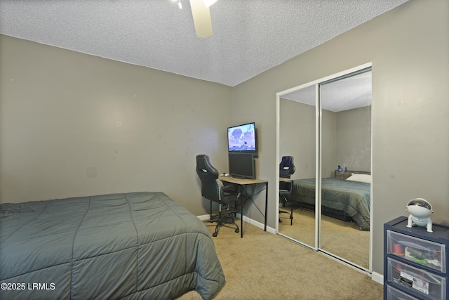 93 Heartstone Cir, Bluffton, SC 29910 - bedroom featuring a textured ceiling, carpet, a closet, a ceiling fan, and baseboards