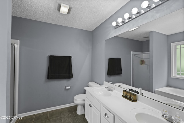93 Heartstone Cir, Bluffton, SC 29910 - full bath featuring a stall shower, a garden tub, double vanity, a textured ceiling, and toilet