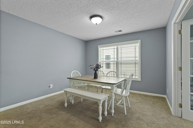 93 Heartstone Cir, Bluffton, SC 29910 - carpeted dining area with a textured ceiling and baseboards