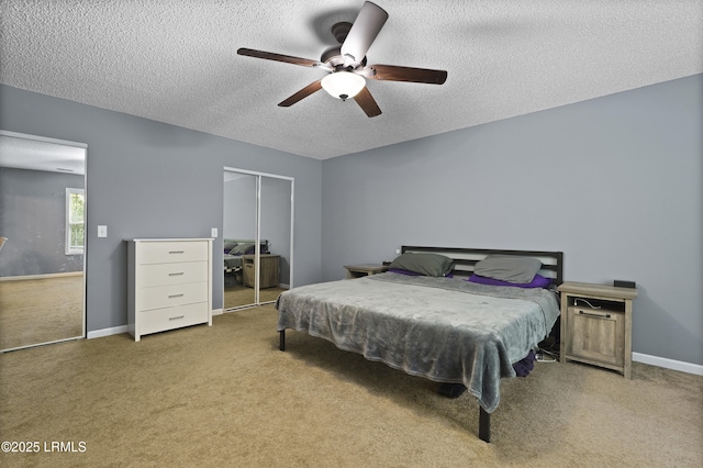 93 Heartstone Cir, Bluffton, SC 29910 - bedroom featuring carpet flooring, a textured ceiling, a closet, a ceiling fan, and baseboards